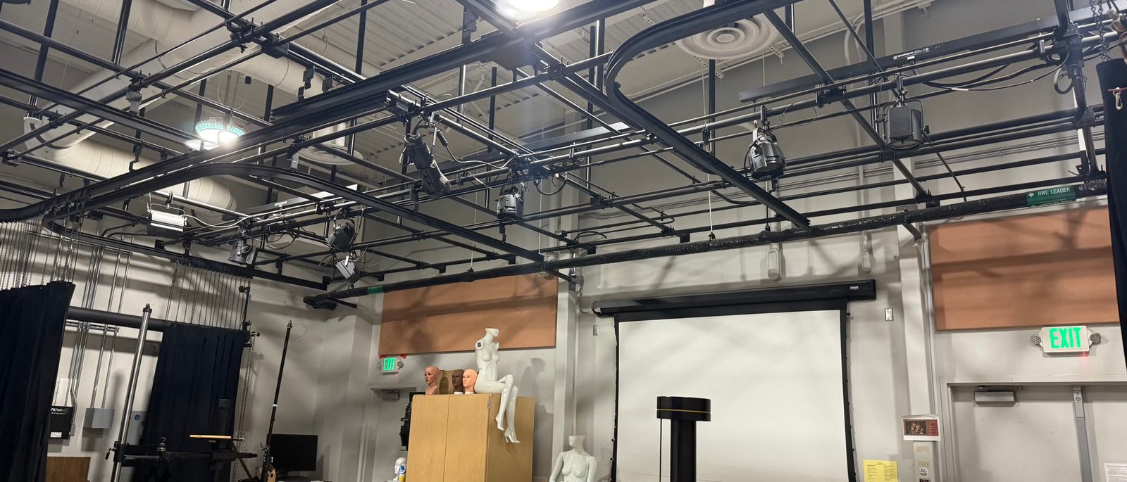 The lighting grid above the Cabrillo studio, hung with fresnels and LED fixtures